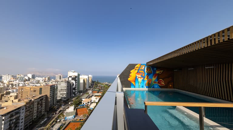 Rooftop Pool Area with City View