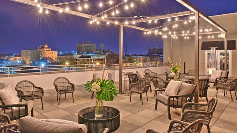 Outdoor Patio Seating Area with Chairs at Night