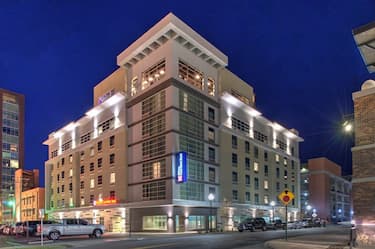 Exterior View of Hotel in Evening From Across Street