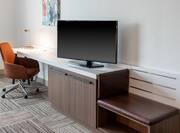 Guestroom with Work Desk and TV