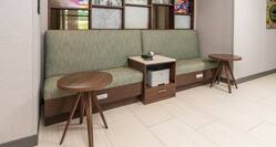 Business center with comfortable seating and tables