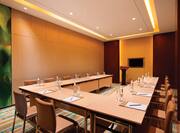 Baisha Meeting Room Meeting Room With U-Table and Chairs Facing Monitor and Podium