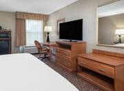 Guest Room with Bed, Work Desk, Kitchenette, and HDTV 