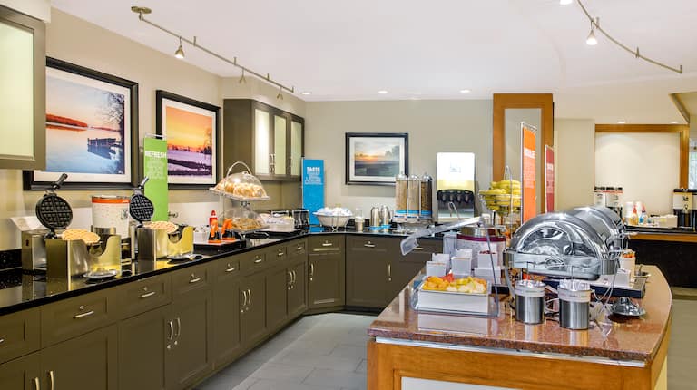 Breakfast Buffet Lobby with Waffle Irons, Cold Cereal, Fruit and Pastries