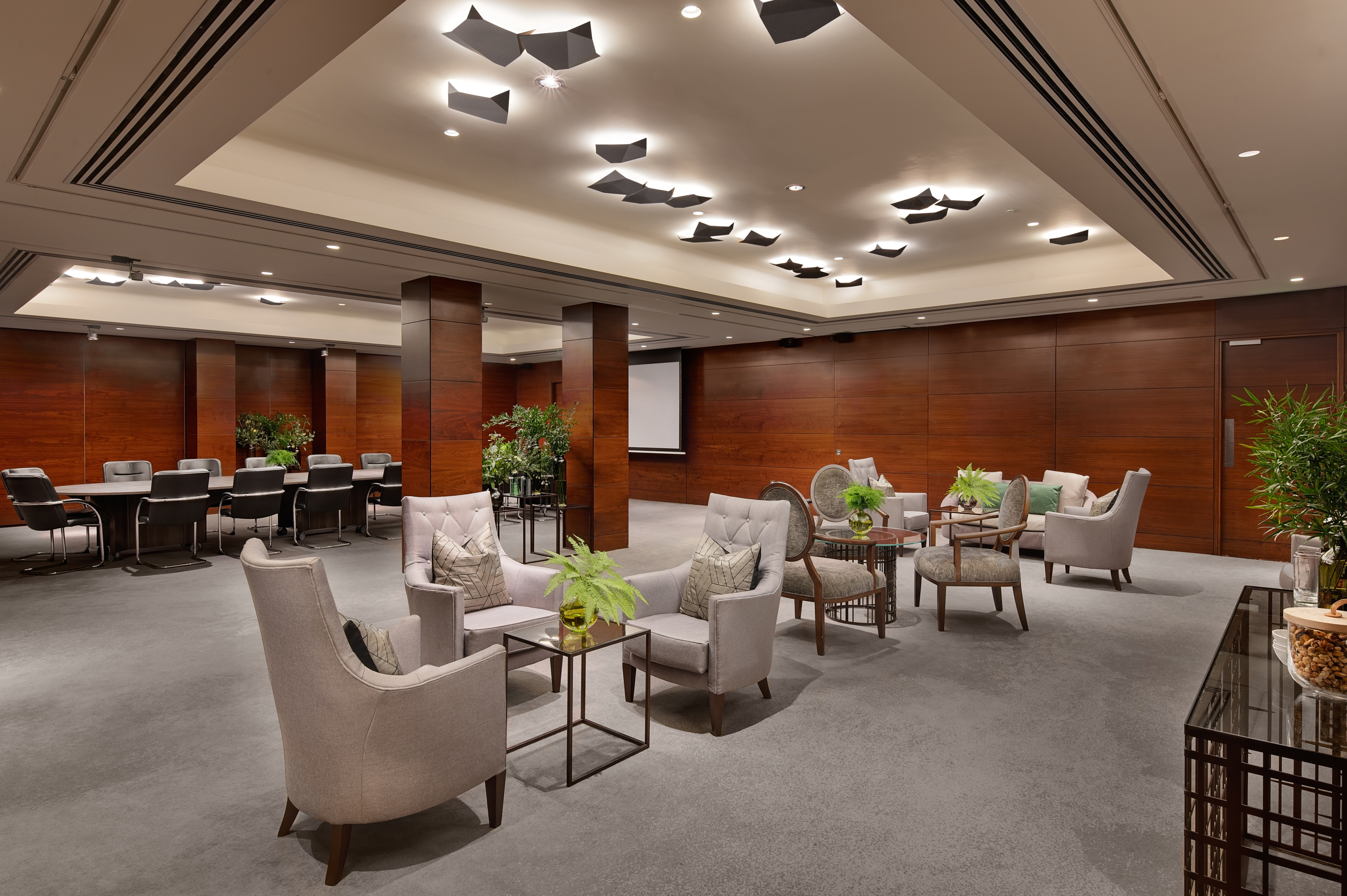 meeting space with lounge area and boardroom table