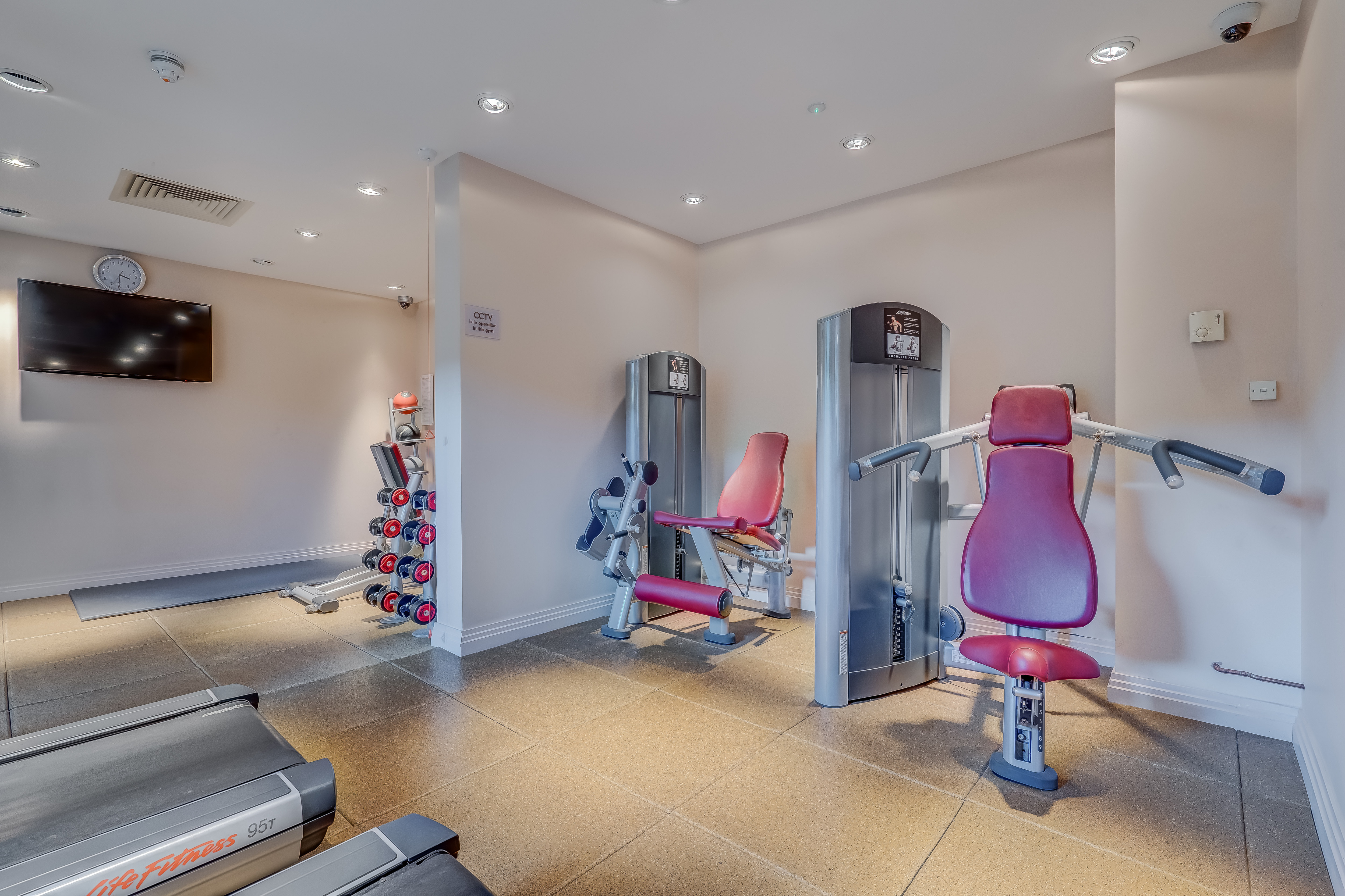 Fitness Center Workout Area with TV