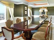 Presidential Suite Dining Room With Table and Chairs