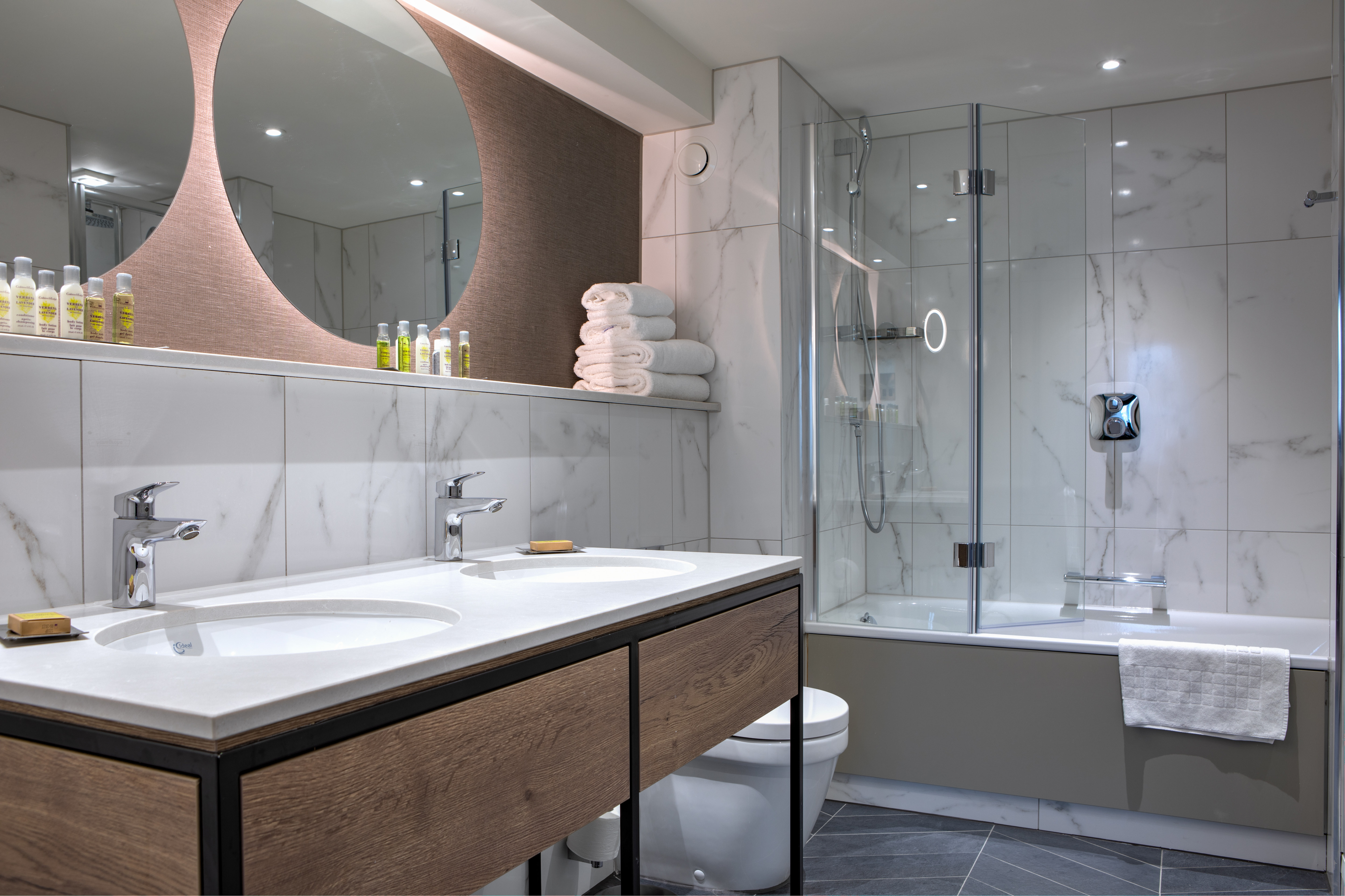 Junior Suite Bathroom with Dual Vanity and Bathtub and Handheld Showerhead