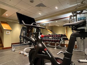 fitness center, Peloton bike, free weights