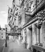Hotel Exterior on street with flags