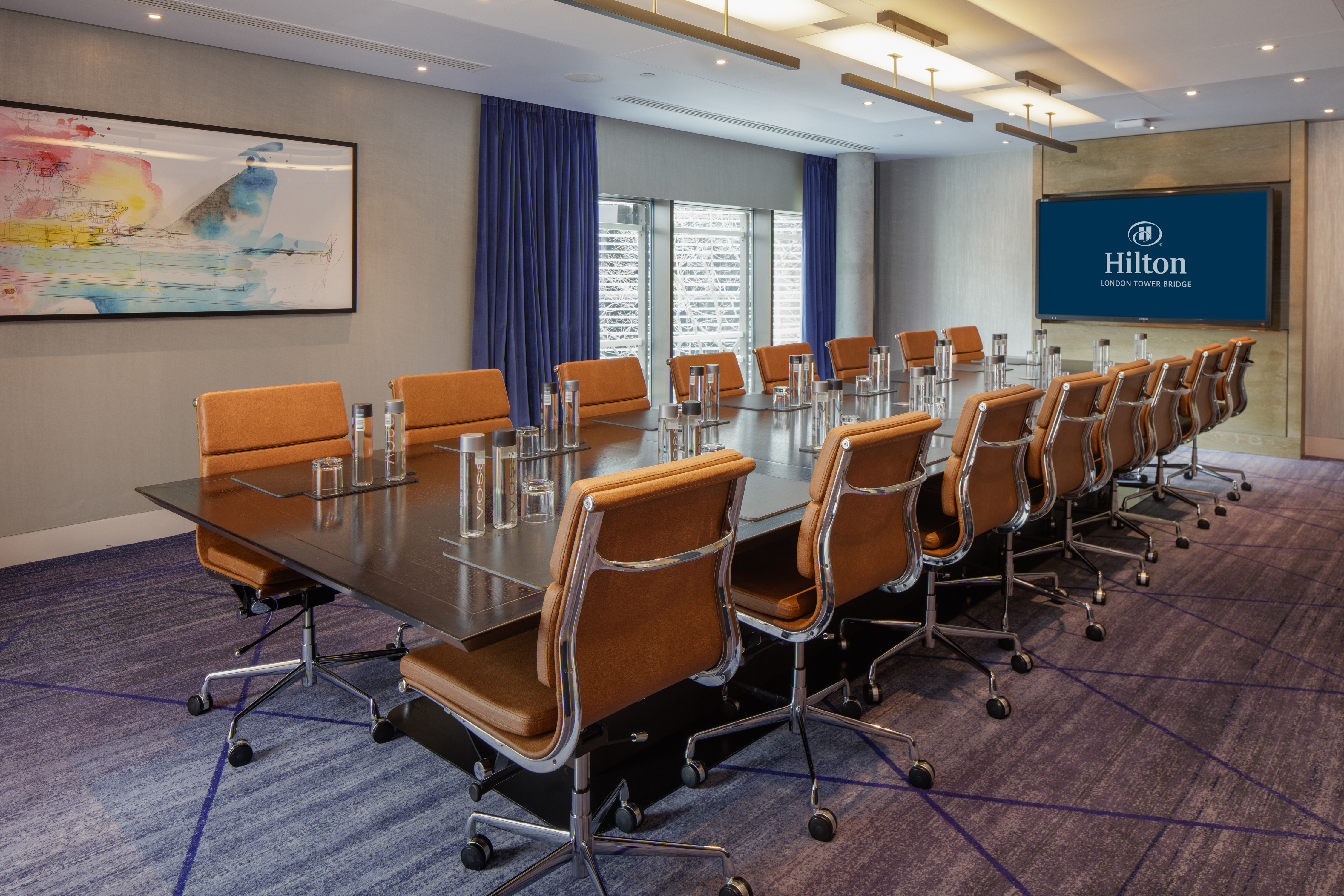 Boardroom with Conference Table and Wall Mounted Television