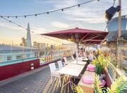 Pink Gin Terrace with View of City