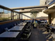 Rooftop restaurant private event dining area with open ceiling