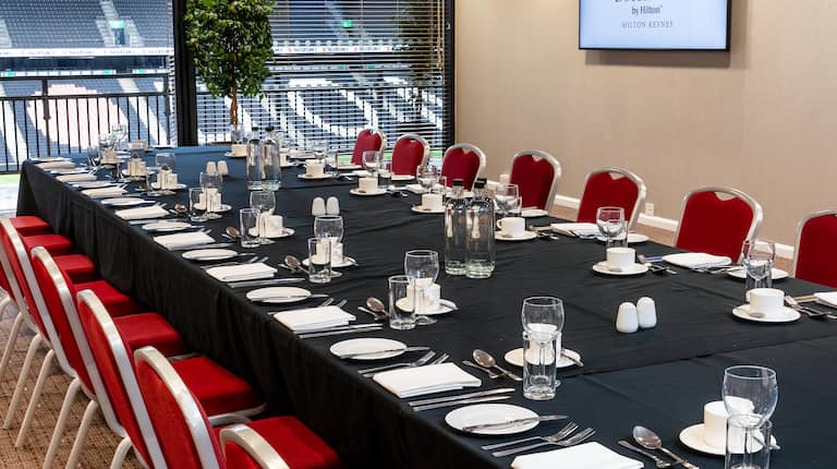 Large Table in Meeting Room Setup for Event