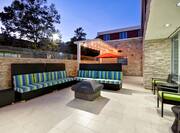 Outdoor Lounge and Patio with Firepit at Sunset