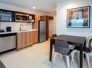 Suite With Kitchen & Dining Table