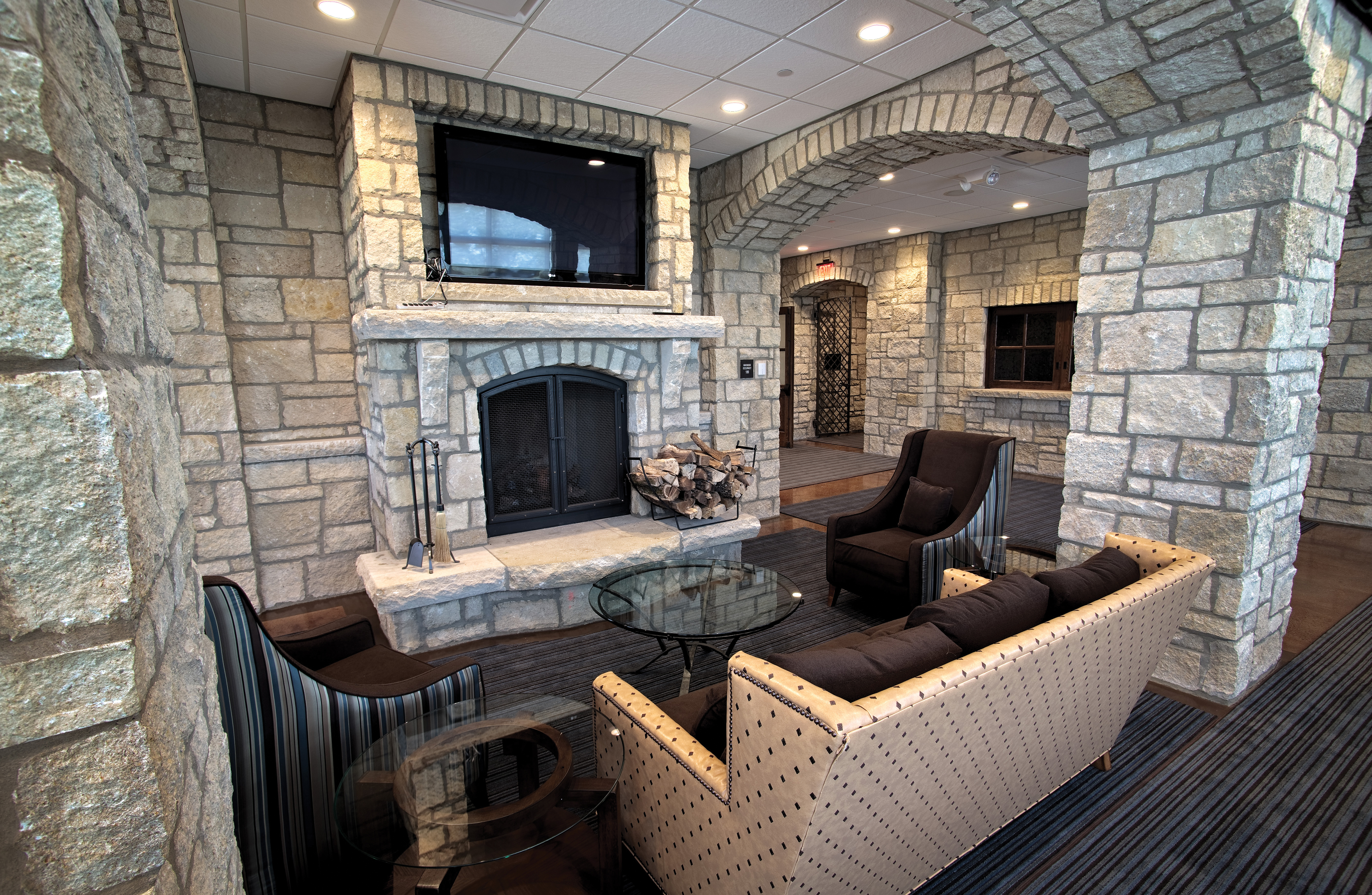 Lobby seating with fireplace and wall mounted TV