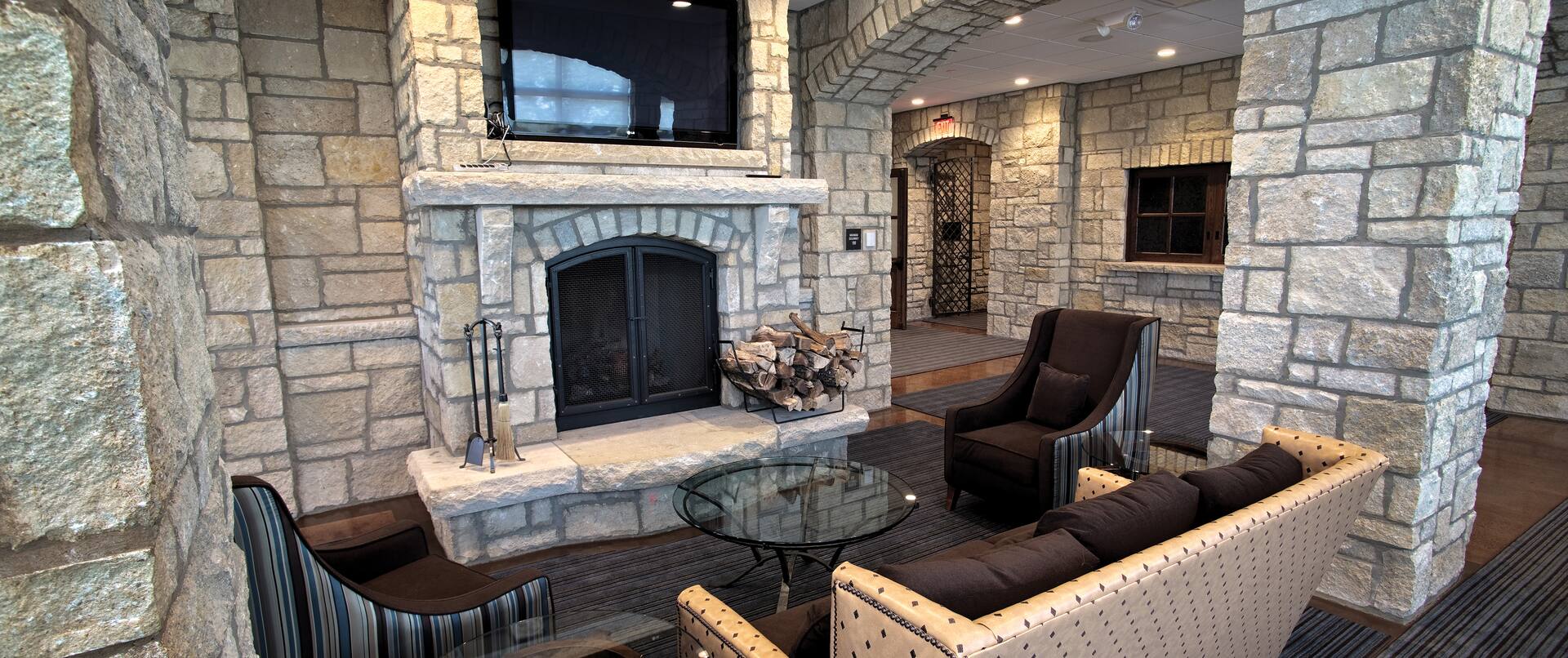 Lobby seating with fireplace and wall mounted TV