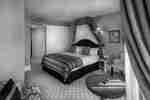 King Guestroom With Lounge Chairs and Table