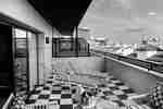 Guestroom Terrace With Multiple Lounge Areas and View of the City