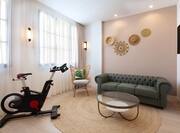 Living Area in Guest Room with Fitness Equipment