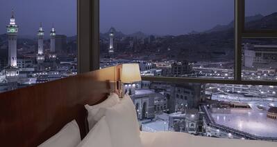 Suite with Large Windows Showing View of the Kaaba at Night
