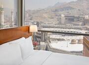 Guest Suite Bed with Outside City View