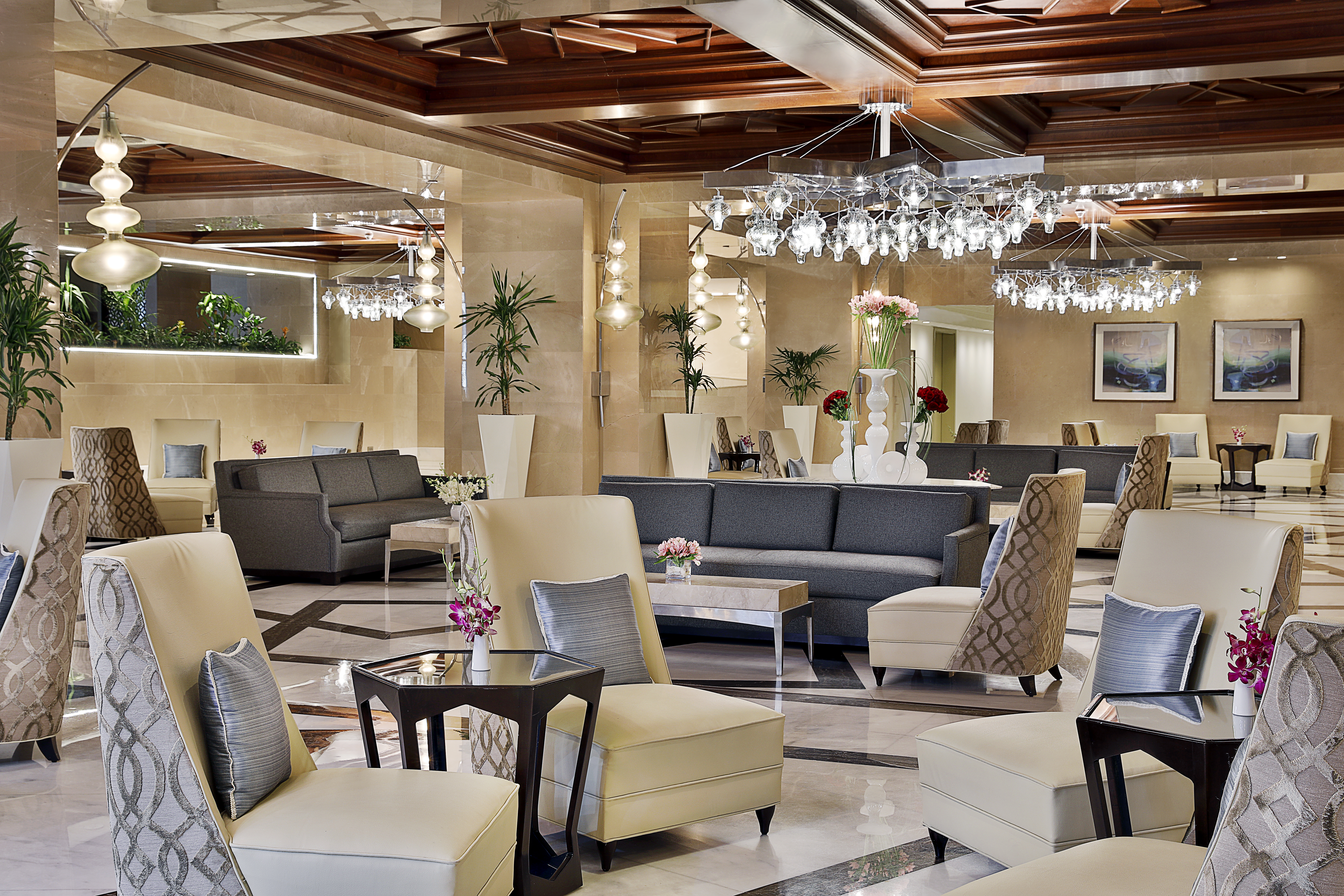 Hotel Lobby Seating Area with Chairs, Tables and Sofa