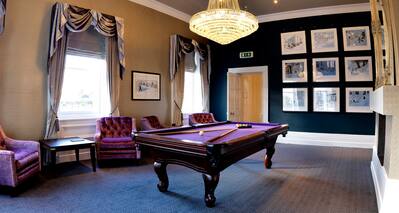 Games Room with Armchairs, Coffee Table and Pool Table