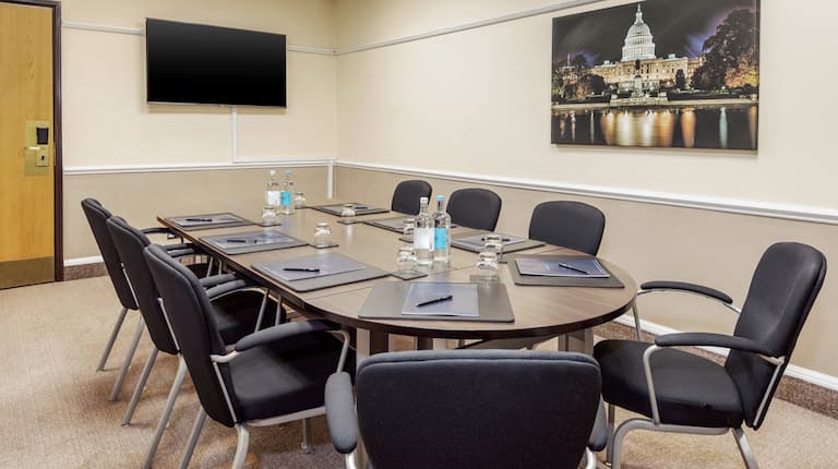 DoubleTree Manchester Airport Dulles Boardroom with Table, Chairs, and Room Technology