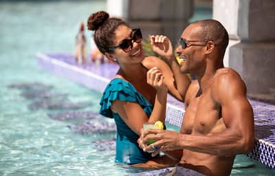 couple at poolside bar