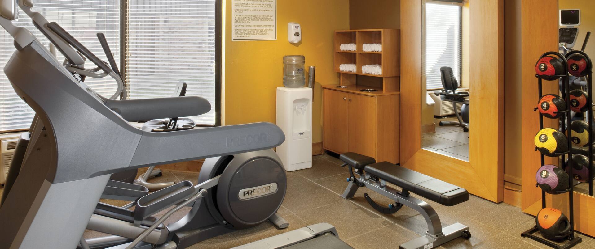 Fitness Center with Treadmill, Cross-Trainer and Weight Bench