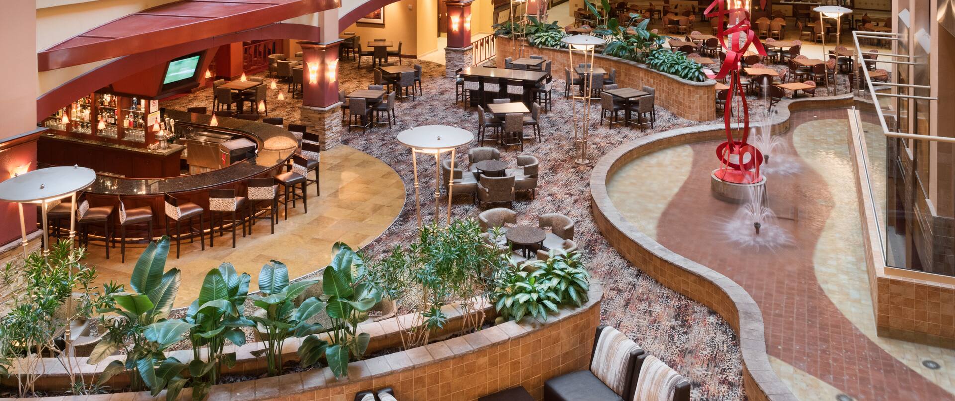 Overview of Atrium Lobby with Bar and Seating Areas