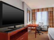 Guest Room Work Desk and Flatscreen TV