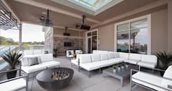 Tables and Soft Seating Outdoor Patio With TVs, Ceiling Fans and Sound System