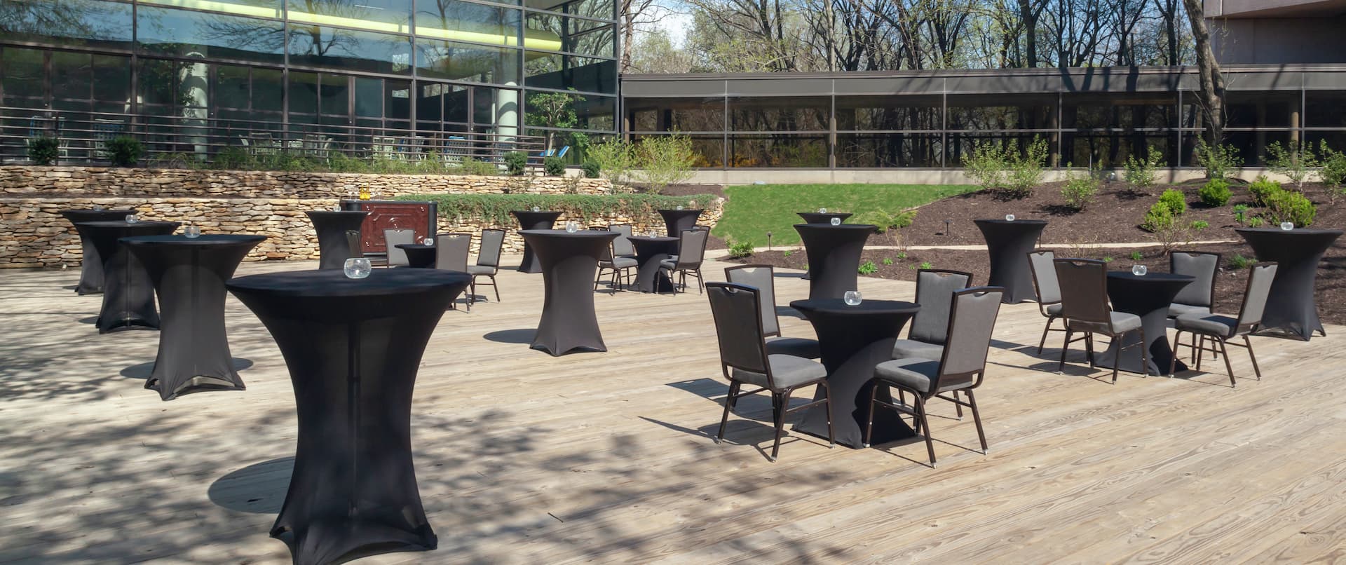 a courtyard deck with tables