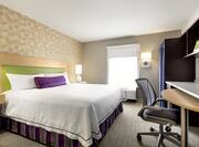 King Bed and Work Desk in Suite