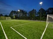 outdoor soccer field at dusk