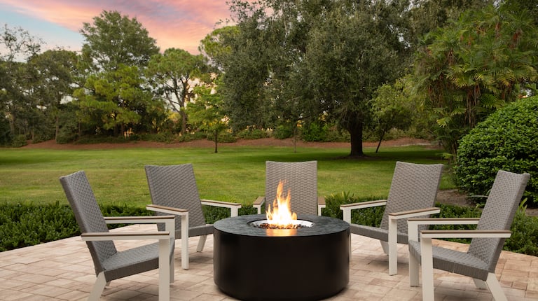 outdoor patio, lounge chairs, fire pit