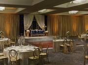 wedding reception tables in a ballroom