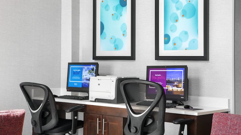 Business Center with Two Computers, Two Chairs and Printer