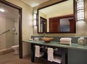 Guest Bathroom with Vanity, Mirror and Shower with Glass Door