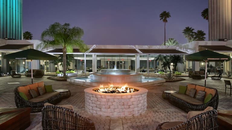 Courtyard with Seats Around Firepit at Night