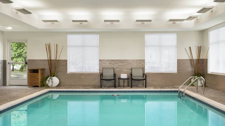 Spacious indoor pool with ample seating.