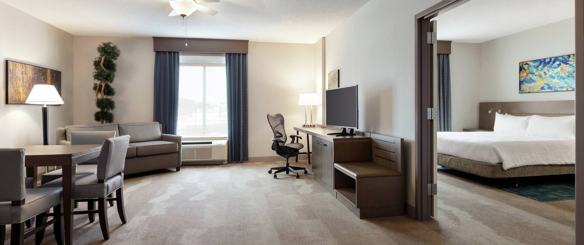 King Suite with Bed, Lounge Area, Work Desk, Room Technology, and Dining Area