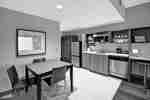 King Bed Kitchenette and Dining Area
