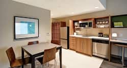 King Bed Kitchenette and Dining Area