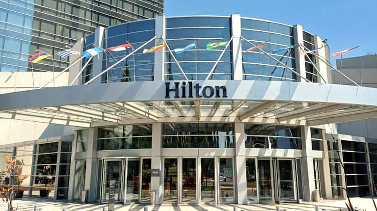 Hilton Hotel Exterior Entrance with Flags