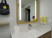 Guest Room Bathroom Vanity with Sink and Mirror
