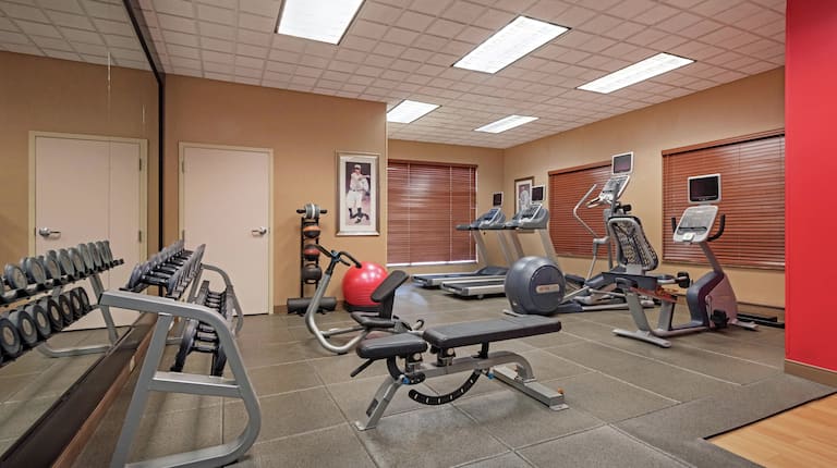 Fitness Center with Dumbbells, Treadmills, and Recumbent Bike